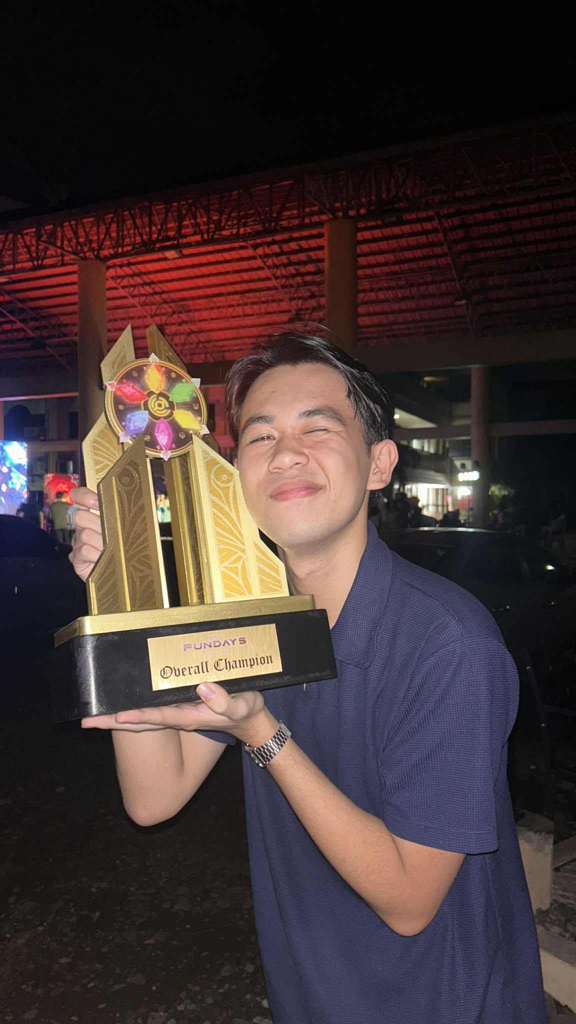 Celebrating with a competition trophy
